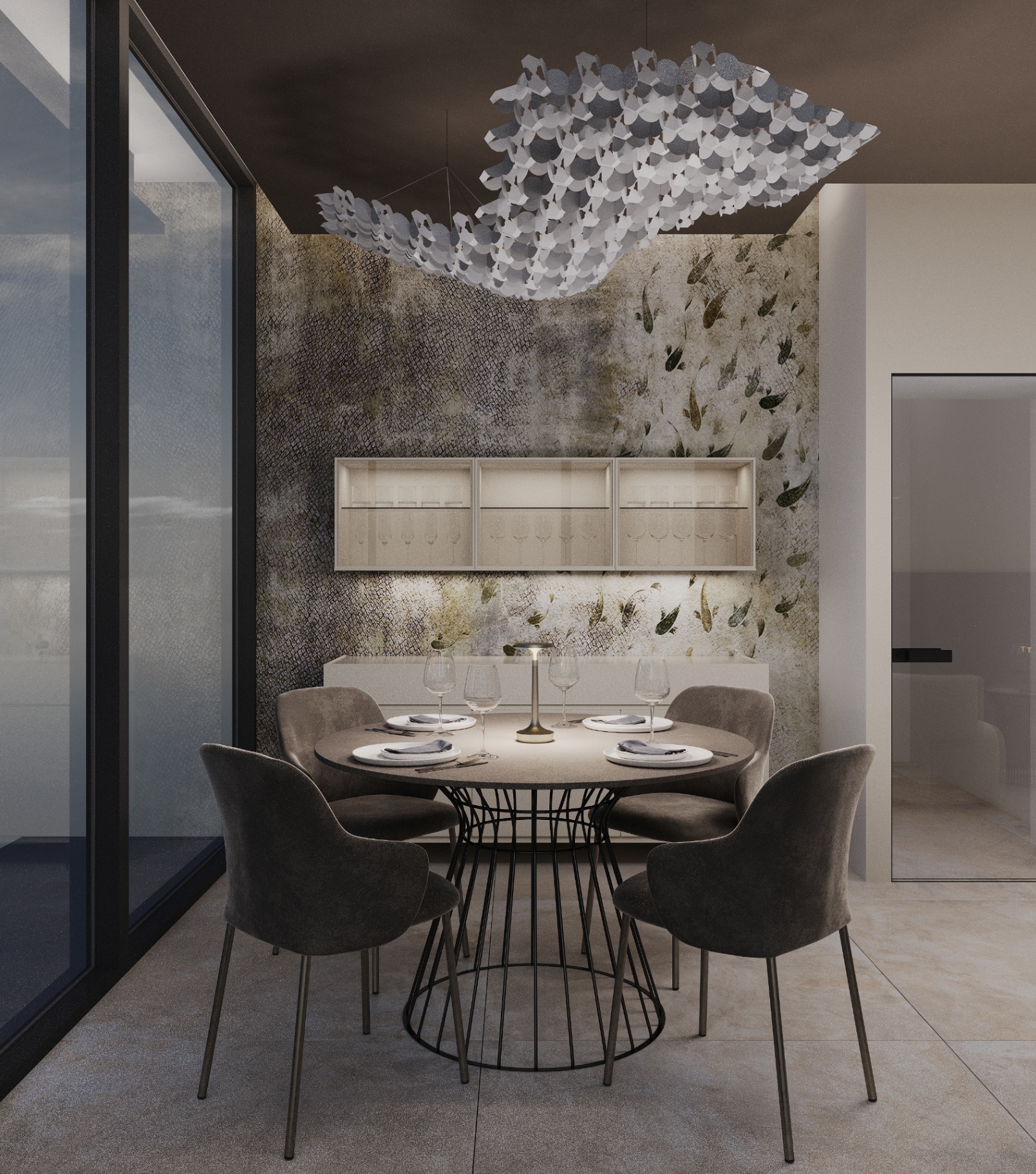 Sala da pranzo con tavolo tondo e sospensione a nuvola