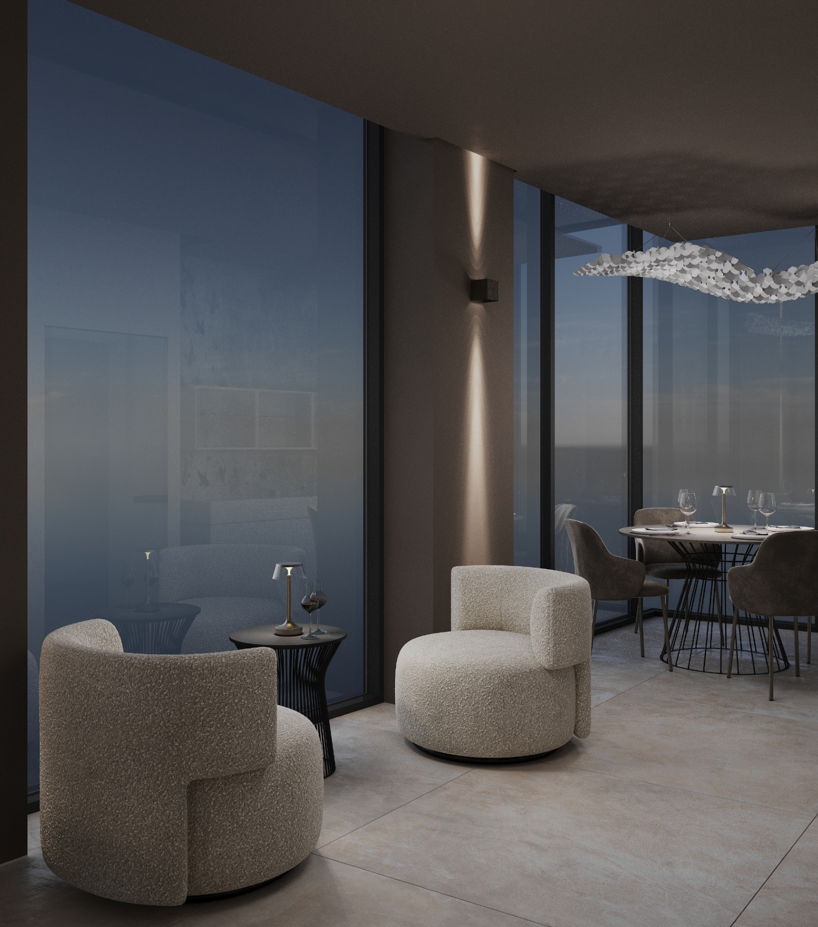 Lounge notturna con poltrone tondeggianti in bouclé