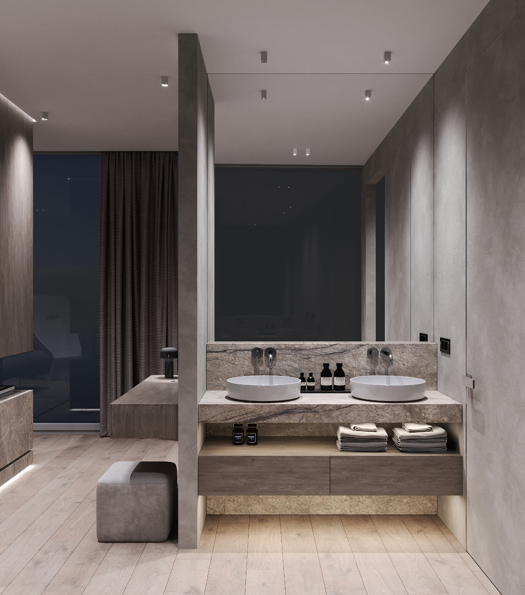 Bagno padronale notturno con doppio lavabo su top in marmo